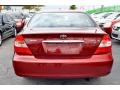 2003 Salsa Red Pearl Toyota Camry XLE V6  photo #48