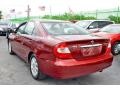 2003 Salsa Red Pearl Toyota Camry XLE V6  photo #49