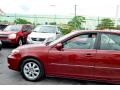 2003 Salsa Red Pearl Toyota Camry XLE V6  photo #55