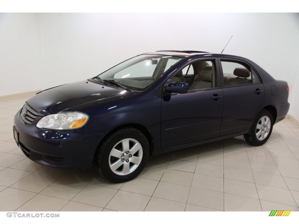 Indigo Ink Blue Pearl 2004 Toyota Corolla LE Exterior Photo #101778342