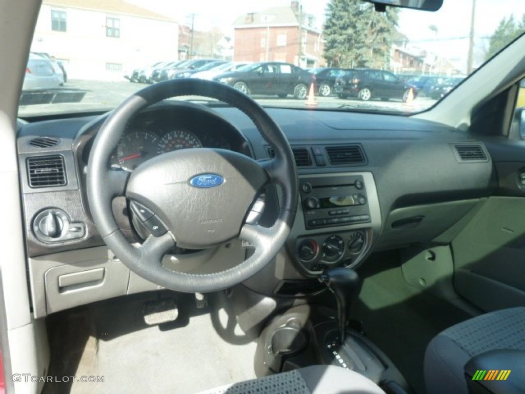 2006 Focus ZX4 SES Sedan - Dark Toreador Red Metallic / Dark Flint/Light Flint photo #6