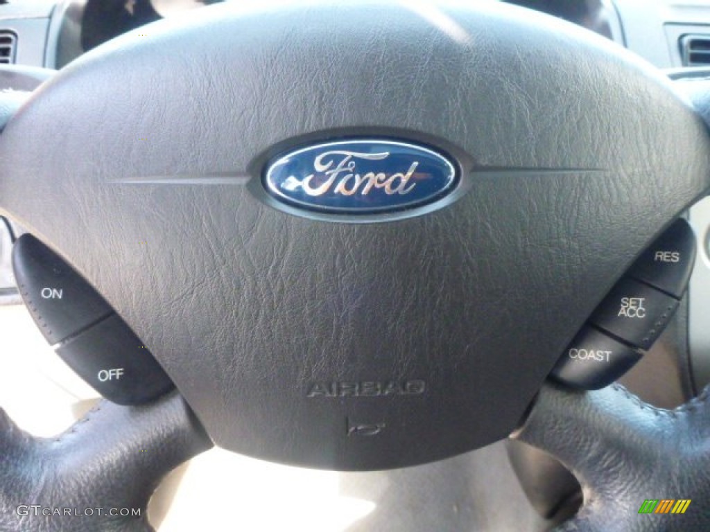 2006 Focus ZX4 SES Sedan - Dark Toreador Red Metallic / Dark Flint/Light Flint photo #21