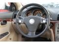 Tan 2009 Saturn Aura Hybrid Steering Wheel