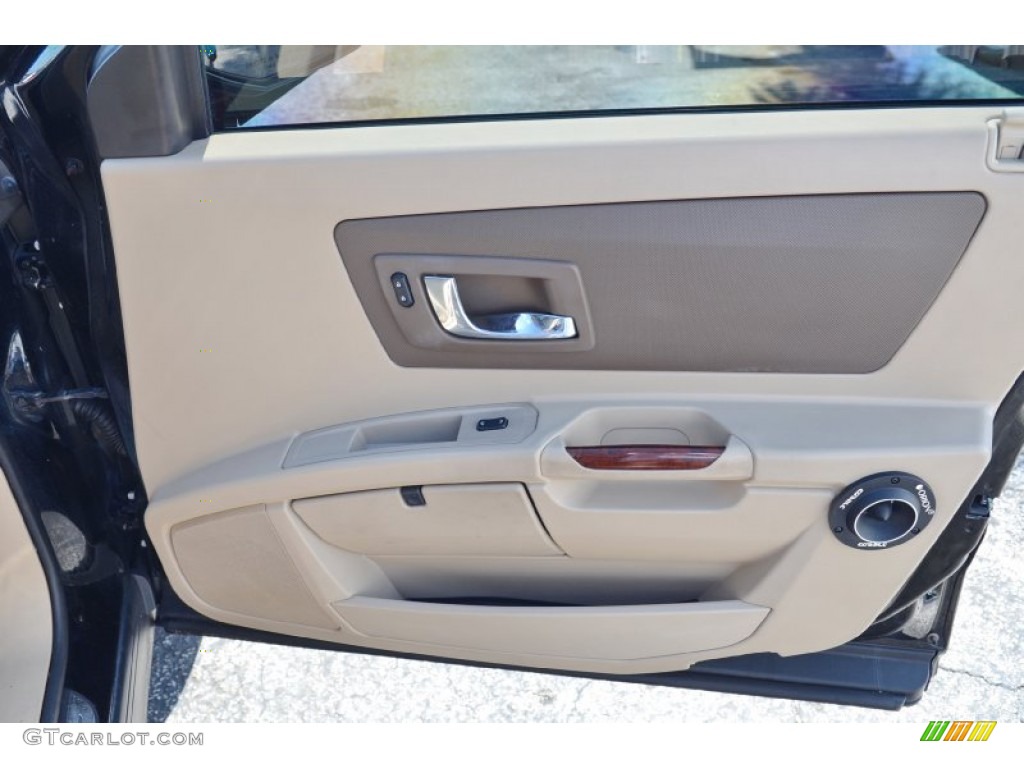 2006 Cadillac SRX V6 Ebony Door Panel Photo #101897898