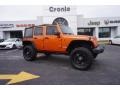 Mango Tango Pearl 2011 Jeep Wrangler Unlimited Rubicon 4x4