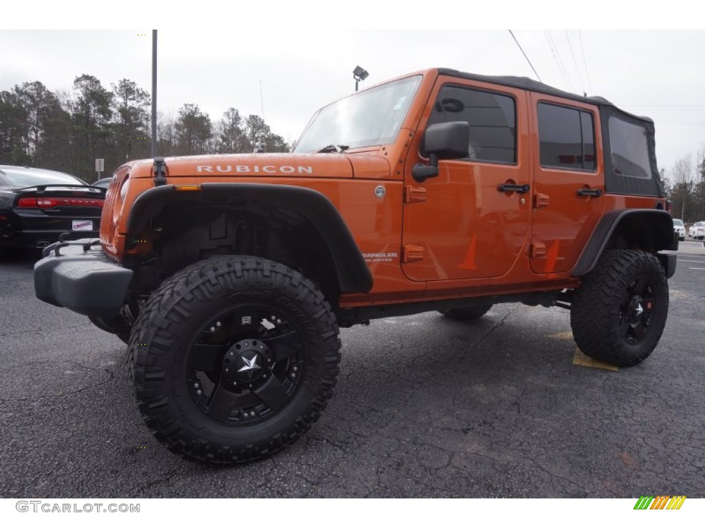 2011 Wrangler Unlimited Rubicon 4x4 - Mango Tango Pearl / Black/Dark Saddle photo #3