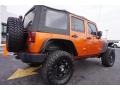 2011 Mango Tango Pearl Jeep Wrangler Unlimited Rubicon 4x4  photo #7