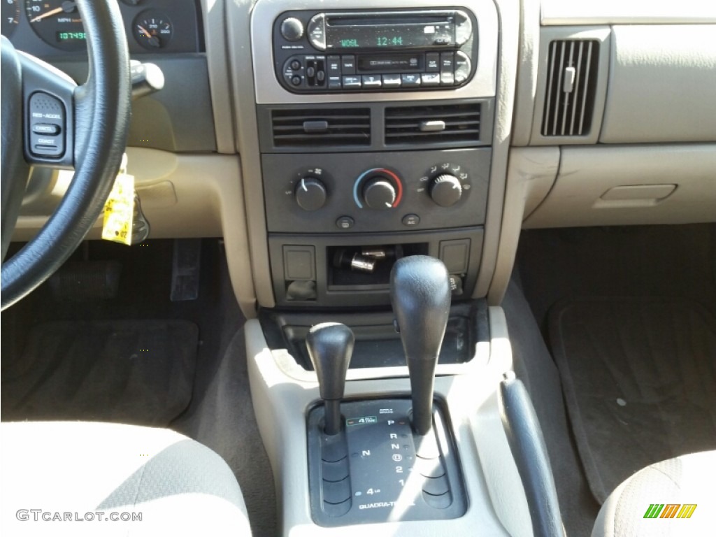 2004 Grand Cherokee Laredo 4x4 - Deep Lava Red Metallic / Taupe photo #16