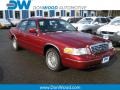 2000 Toreador Red Metallic Ford Crown Victoria LX Sedan  photo #1