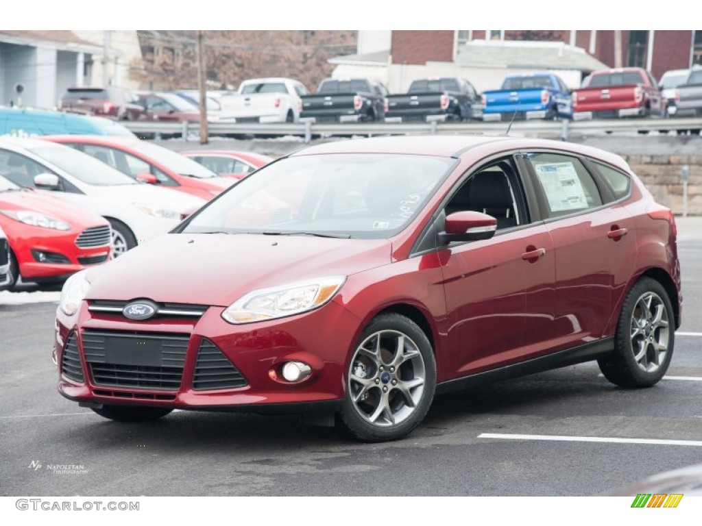 Ruby Red 2014 Ford Focus SE Hatchback Exterior Photo #102083079