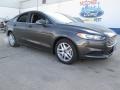 2015 Magnetic Metallic Ford Fusion SE  photo #1