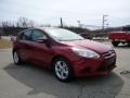 2014 Ruby Red Ford Focus SE Hatchback  photo #1