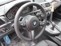 Black 2015 BMW 4 Series 435i xDrive Gran Coupe Steering Wheel
