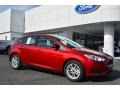 2015 Ruby Red Metallic Ford Focus SE Hatchback  photo #1