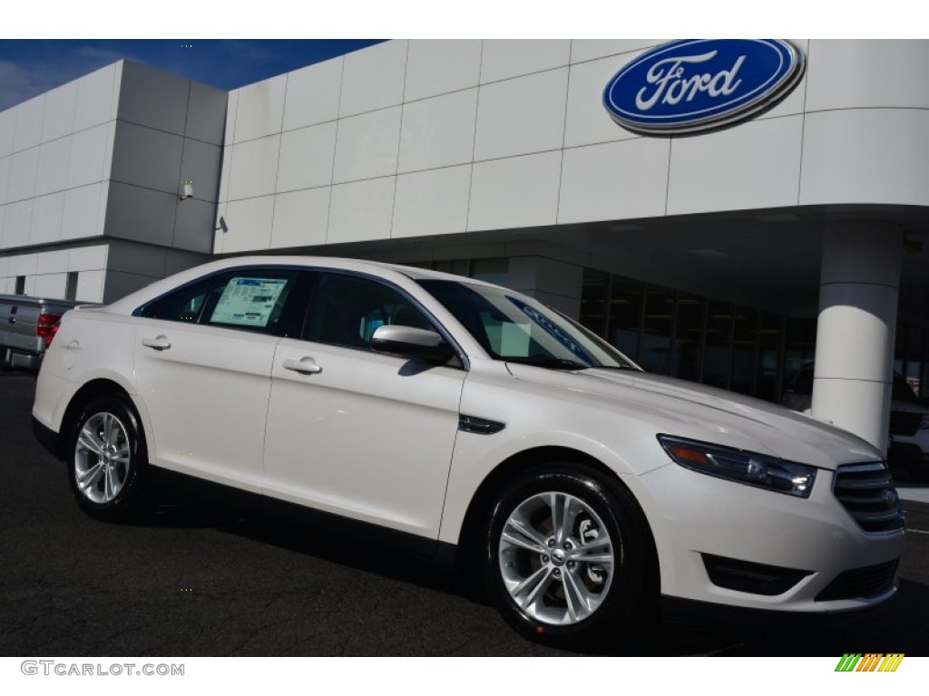 White Platinum Metallic Ford Taurus