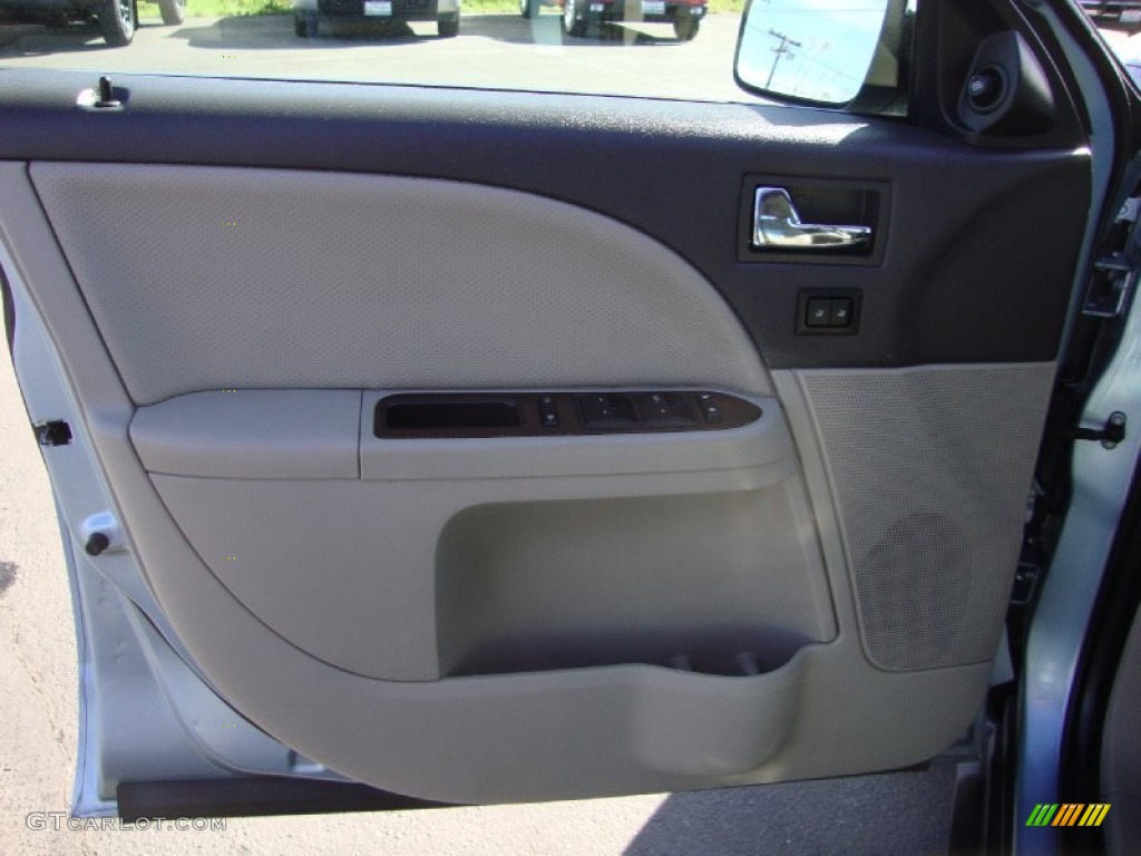 2009 Taurus Limited - Light Ice Blue Metallic / Camel photo #9