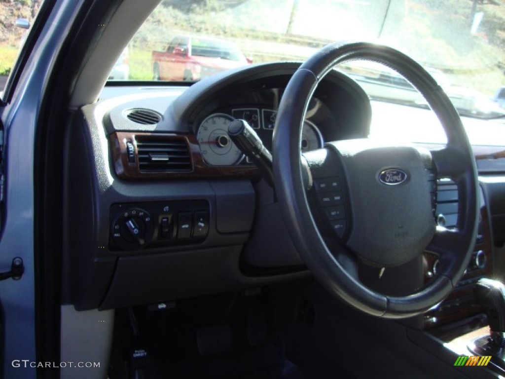 2009 Taurus Limited - Light Ice Blue Metallic / Camel photo #10