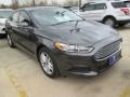 2015 Magnetic Metallic Ford Fusion SE  photo #1