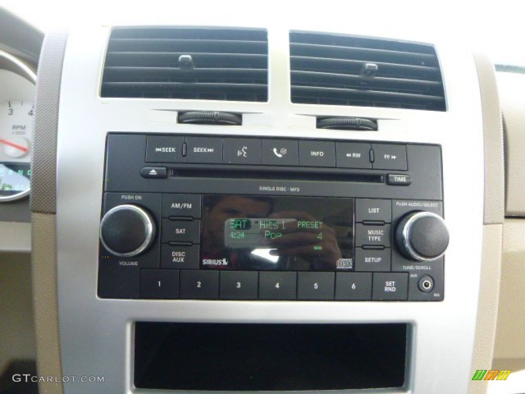 2009 Caliber SXT - Inferno Red Crystal Pearl / Pastel Pebble Beige photo #16