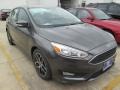 2015 Magnetic Metallic Ford Focus SE Hatchback  photo #1