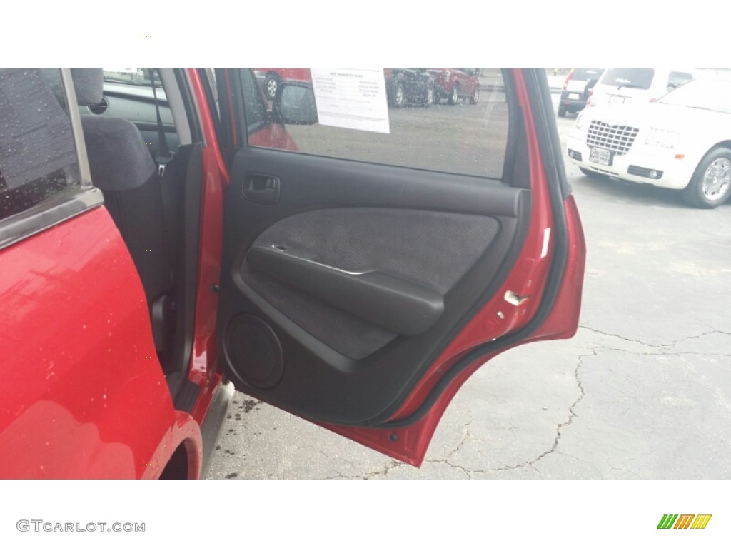 2003 Outlander XLS 4WD - Phoenix Red / Charcoal photo #13
