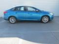 2015 Blue Candy Metallic Ford Focus SE Sedan  photo #3