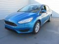2015 Blue Candy Metallic Ford Focus SE Sedan  photo #7