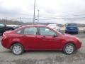 2010 Sangria Red Metallic Ford Focus S Sedan  photo #2