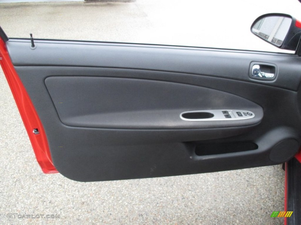 2009 Pontiac G5 XFE Ebony Door Panel Photo #102766949