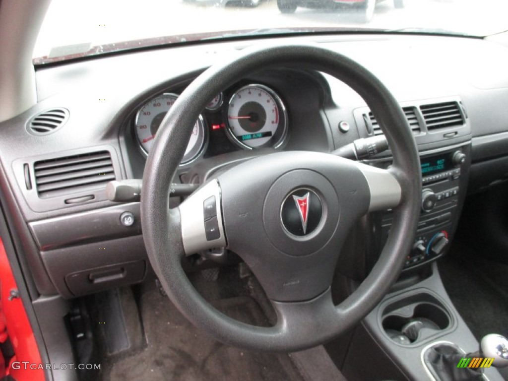 2009 Pontiac G5 XFE Ebony Steering Wheel Photo #102767063