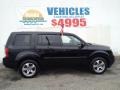 2013 Crystal Black Pearl Honda Pilot EX-L 4WD  photo #28