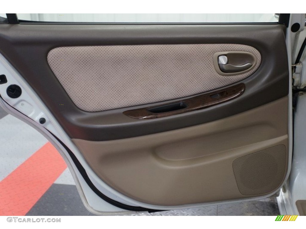 2002 Nissan Maxima SE Blond Door Panel Photo #102871353