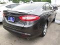 2015 Magnetic Metallic Ford Fusion SE  photo #7