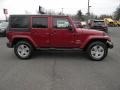 2011 Deep Cherry Red Jeep Wrangler Unlimited Sahara 4x4  photo #5