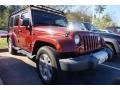 2009 Red Rock Crystal Pearl Jeep Wrangler Unlimited Sahara  photo #4
