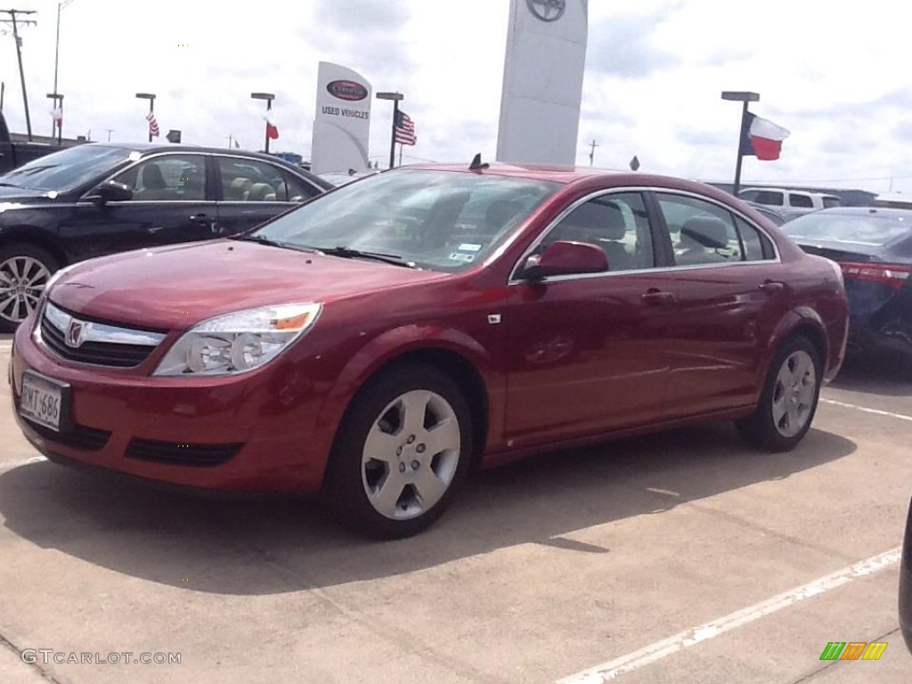 2009 Aura XE - Red Jewel Tintcoat / Tan photo #2