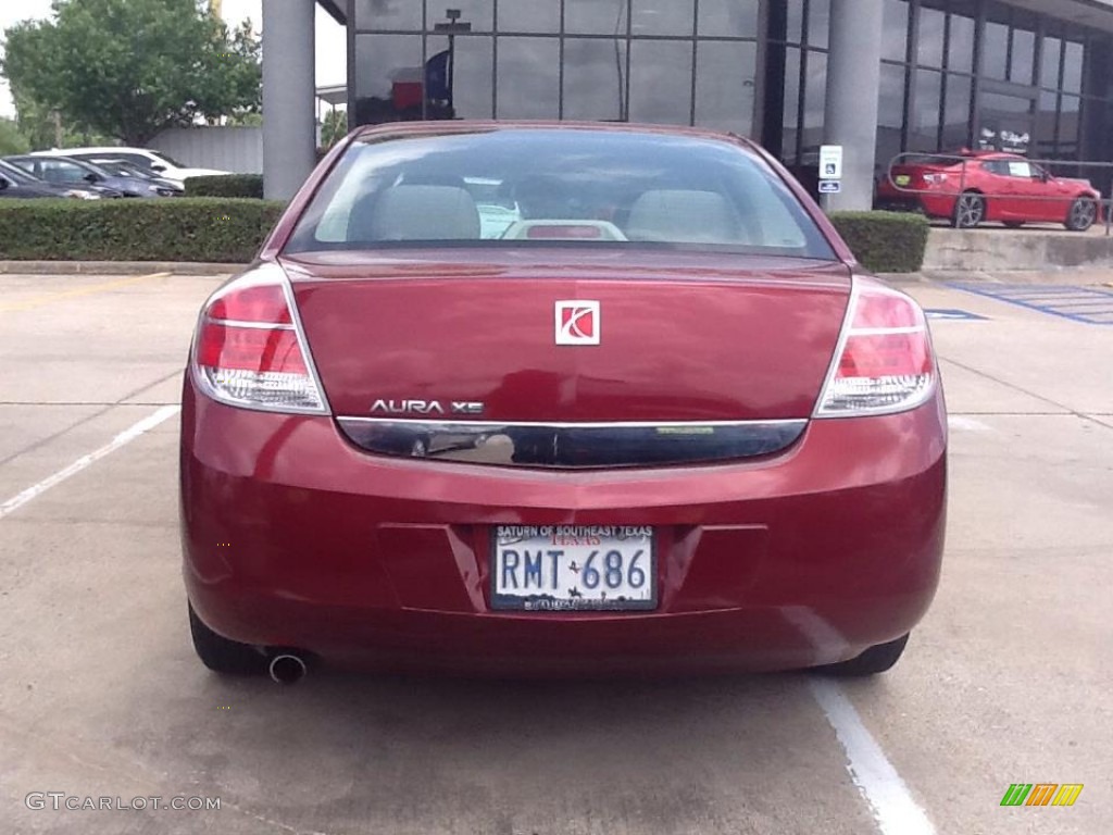 2009 Aura XE - Red Jewel Tintcoat / Tan photo #3