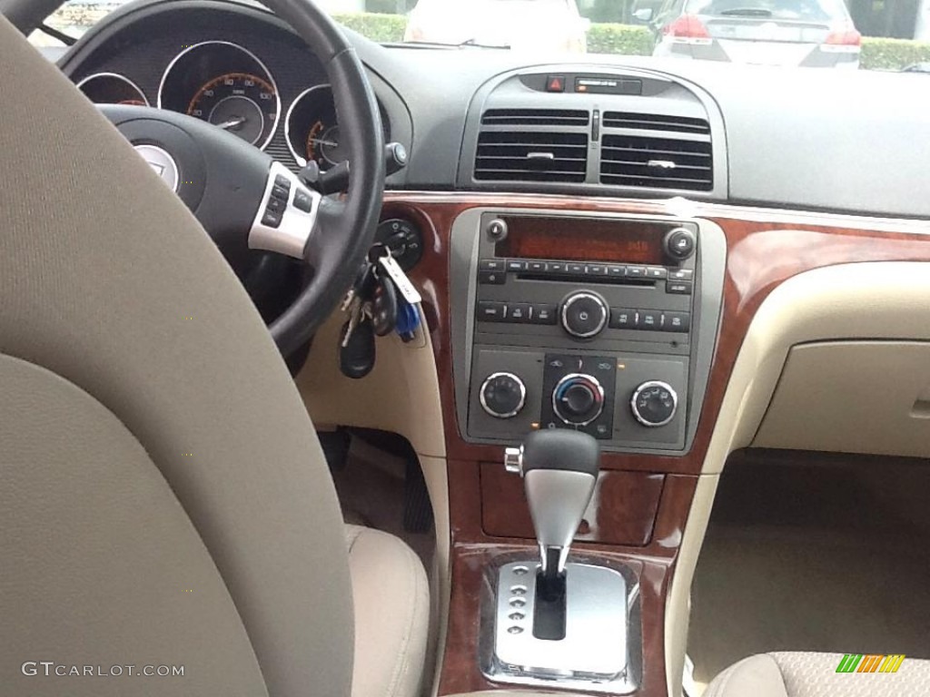 2009 Aura XE - Red Jewel Tintcoat / Tan photo #7