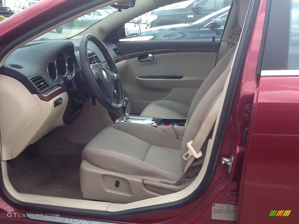 2009 Aura XE - Red Jewel Tintcoat / Tan photo #9