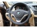 Beige 2015 BMW X1 xDrive28i Steering Wheel