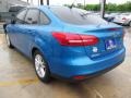 2015 Blue Candy Metallic Ford Focus SE Sedan  photo #6