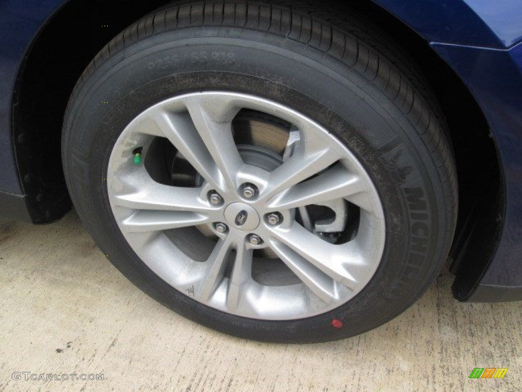 2015 Taurus SE - Deep Impact Blue Metallic / Dune photo #2