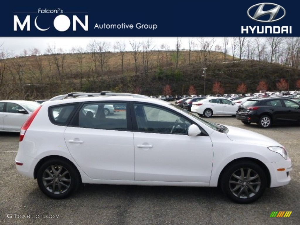 2012 Elantra GLS Touring - Monaco White / Black photo #1