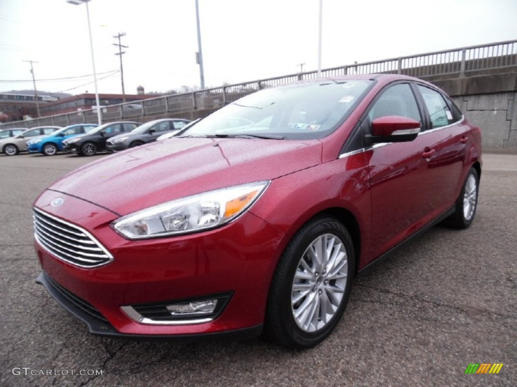 Ruby Red Metallic 2015 Ford Focus Titanium Sedan Exterior Photo #103194121