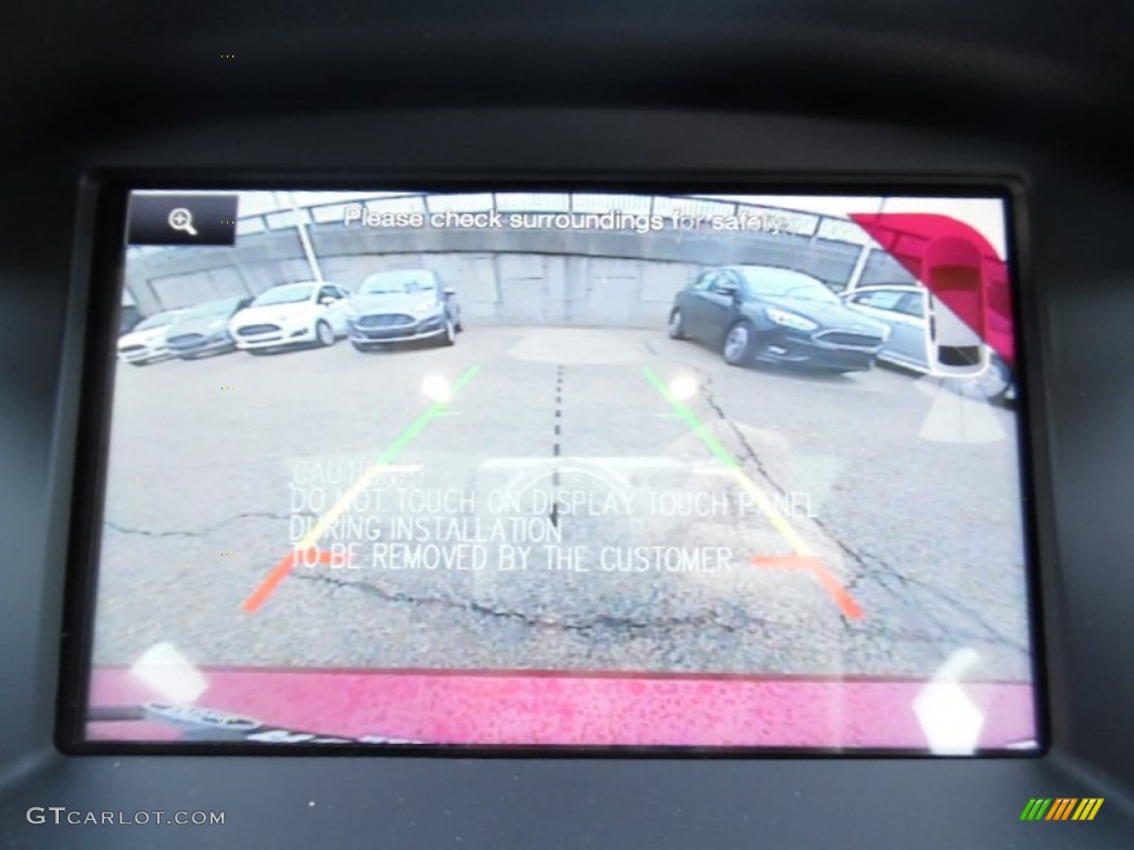 2015 Focus Titanium Sedan - Ruby Red Metallic / Medium Soft Ceramic photo #19