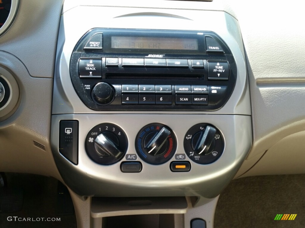 2003 Altima 2.5 SL - Mystic Emerald Green / Blond photo #15
