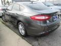2015 Magnetic Metallic Ford Fusion SE  photo #11