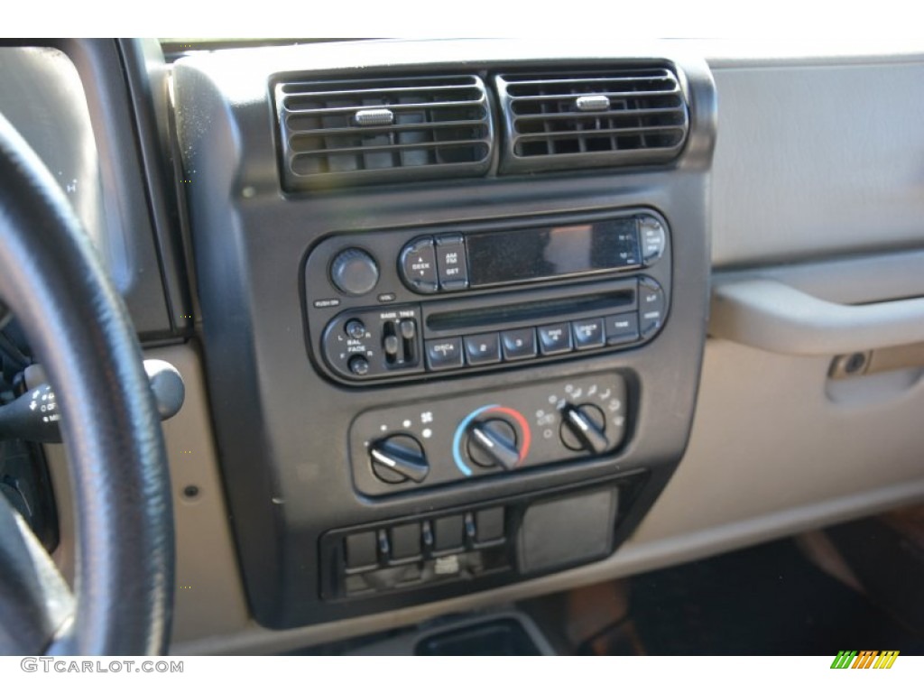 2004 Wrangler Sport 4x4 - Light Khaki Metallic / Khaki photo #22