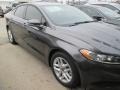 2015 Magnetic Metallic Ford Fusion SE  photo #1