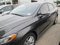 2015 Magnetic Metallic Ford Fusion SE  photo #13